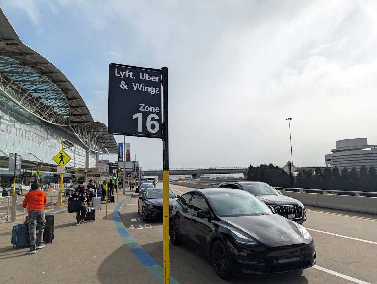 A car parked in front of an airport — Airport pickups that do not go wrong