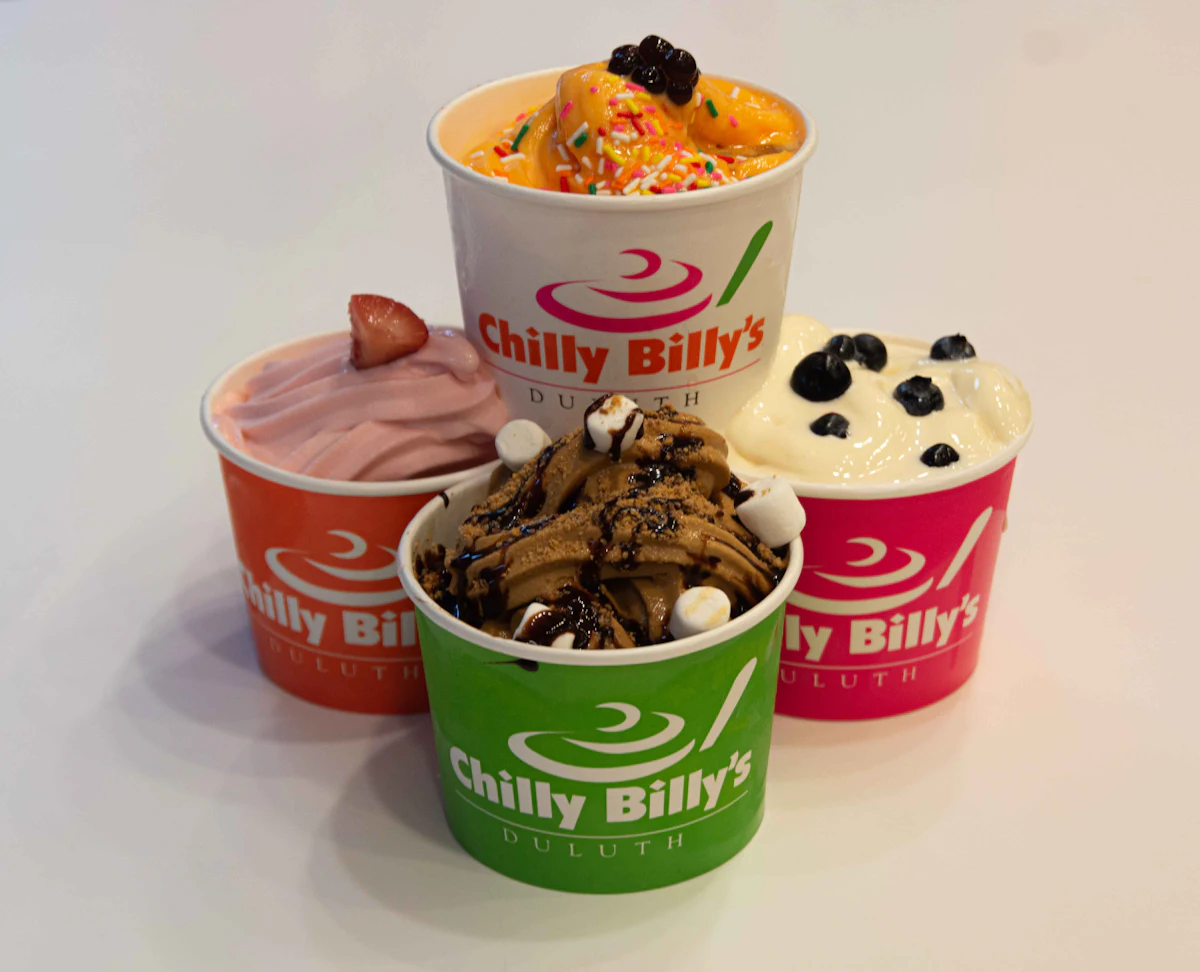 A group of three ice creams sitting on top of a table — Liquid nitrogen ice cream