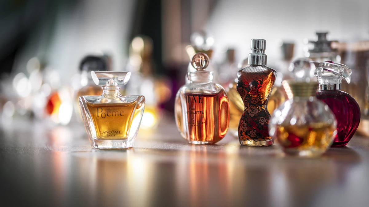 selective focus photography of clear glass perfume bottle — The attar and perfume blending bar