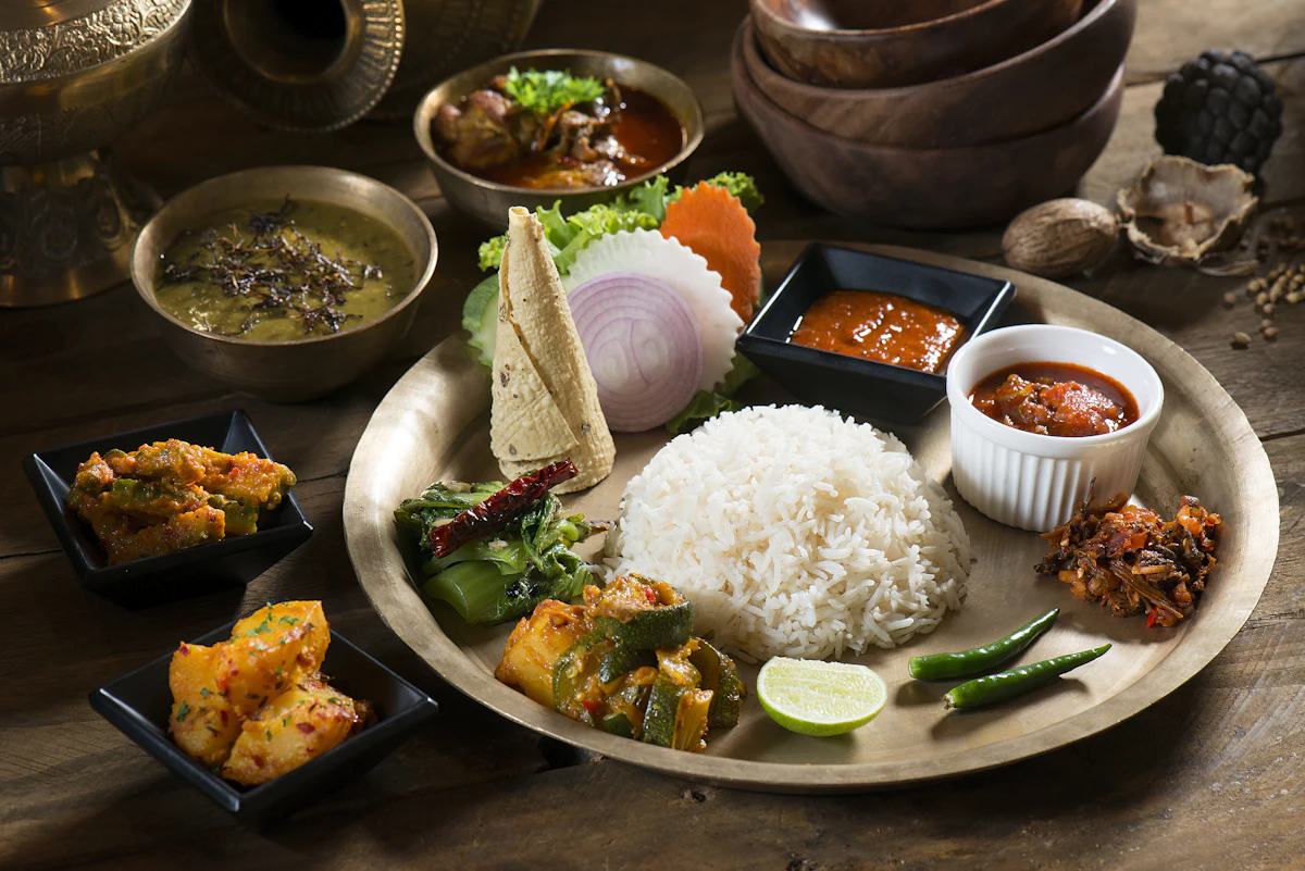 cooked rice with vegetables on plate — Regional thali counters