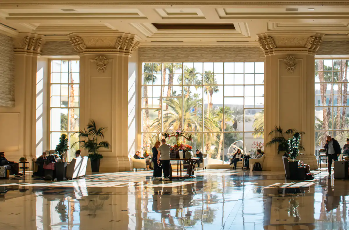 Large, ornate lobby with bright natural light — A rooming list that survives contact with the guests