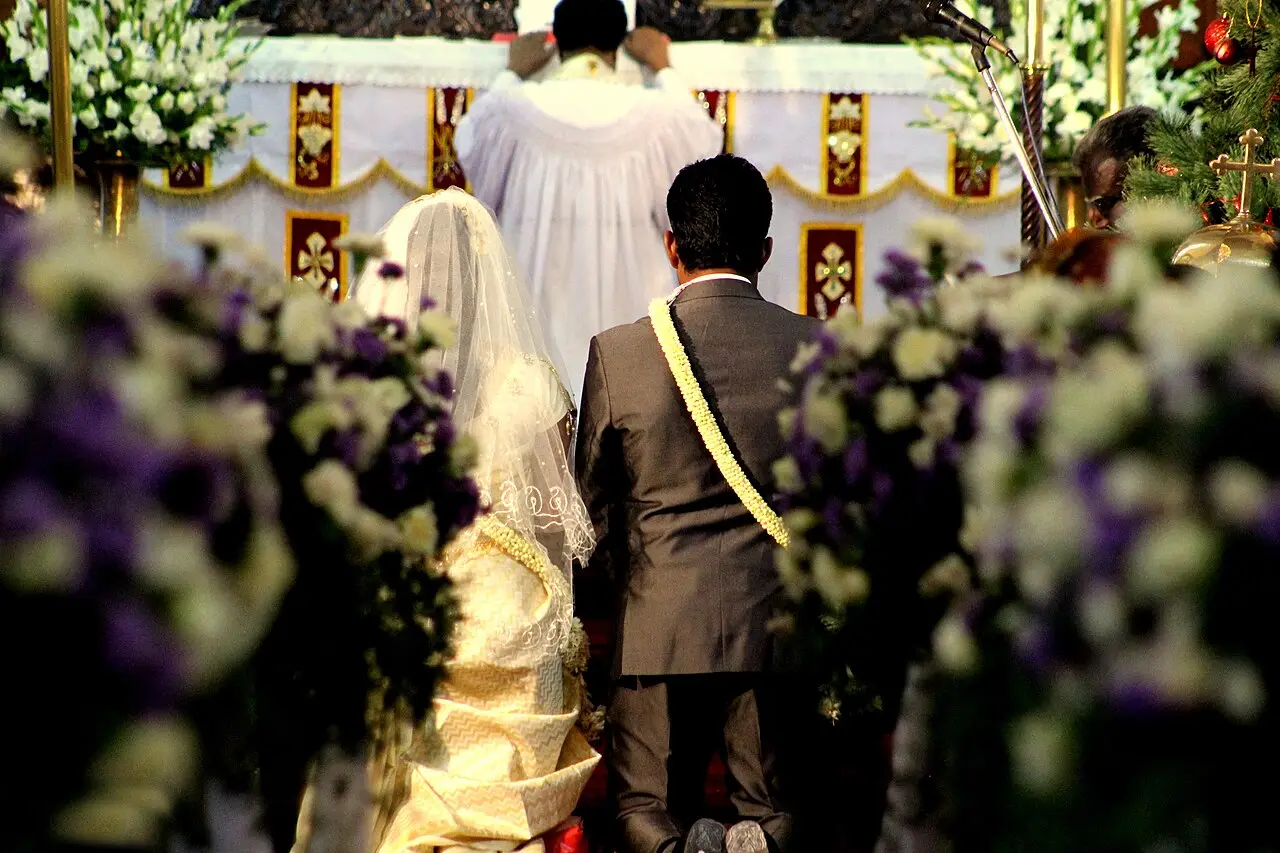 this is a typical christian indian wedding being held in the church — Christian wedding